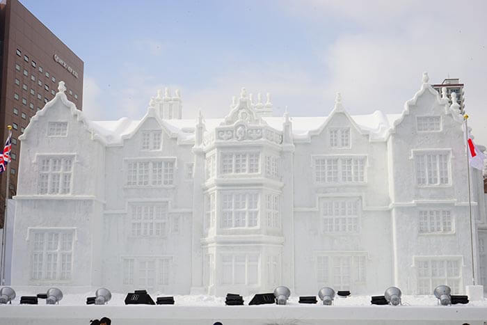 a set of decorative terrace houses carved from snow