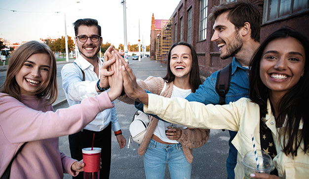 Group of young expats making friends