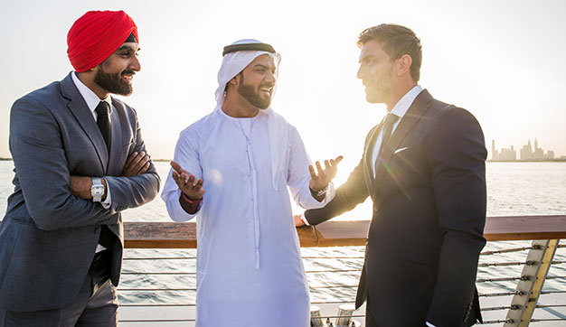 Businessmen in Dubai talking