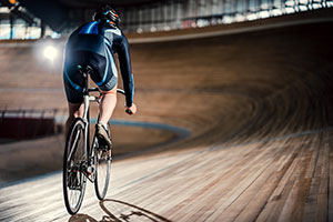 Lone cyclist in the velodrome