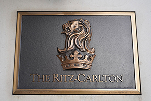 Brass plate with Ritz-Carlton logo embossed