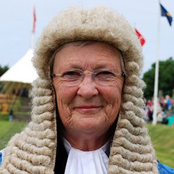 Clare Christian wearing a traditional Judge's full bottomed wig on Tynwald day
