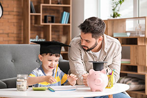 Father teaching his child about finances and managing money