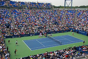Crowds at US open overlooking tennis tournament